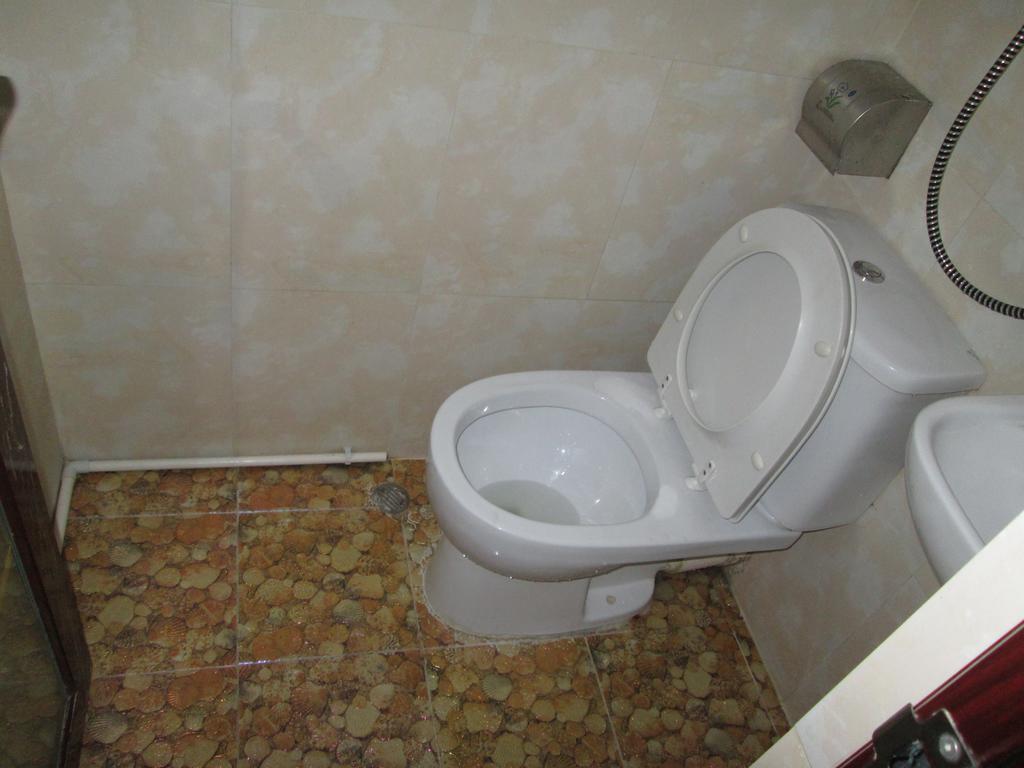 קוולון Global Inn מראה חיצוני תמונה